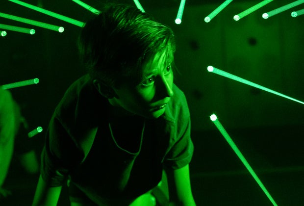 Young boy playing laser dodging games at Activate in Houston