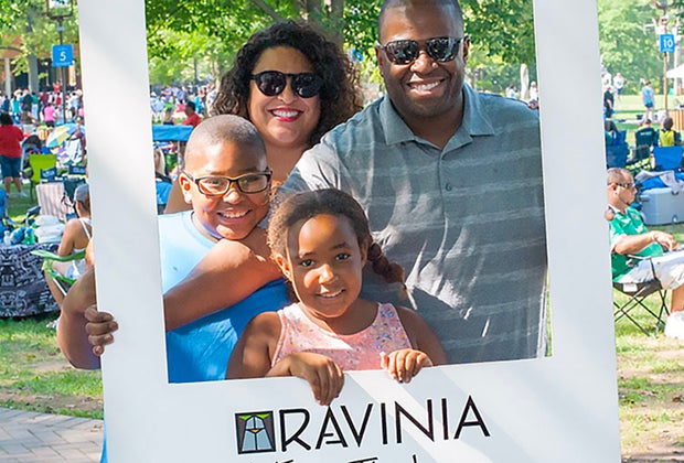 Family enjoying the Ravinia festival in North Shore, a fun day trip from Chicago