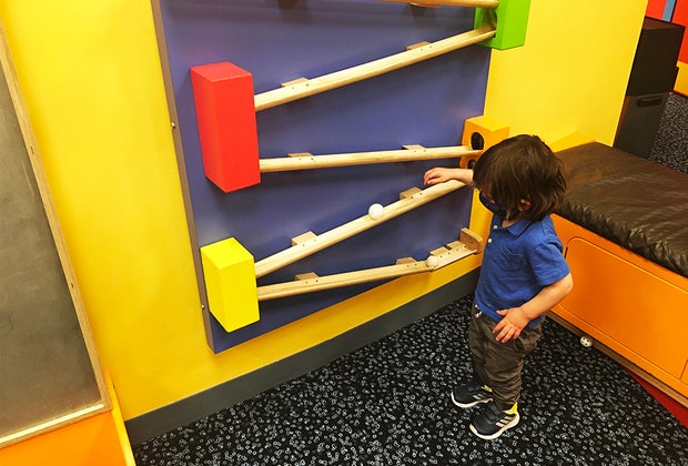 DuPage Children's Museum: balls rolling on wooden wall track