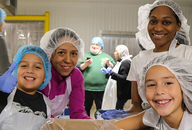 Volunteering in Chicago at the Greater Chicago Food Depository.