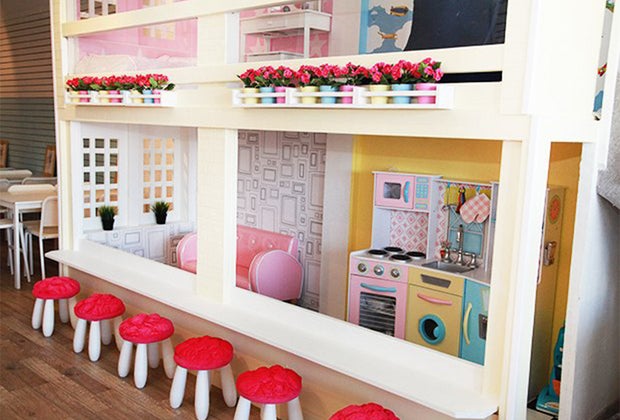 a dollhouse and play space at a Latte Fun Play Spaces on Long Island Open Now