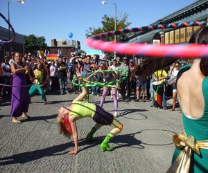 Gawk at the street performers at the Allston Village Street Fair. Photo courtesy of Allston Village