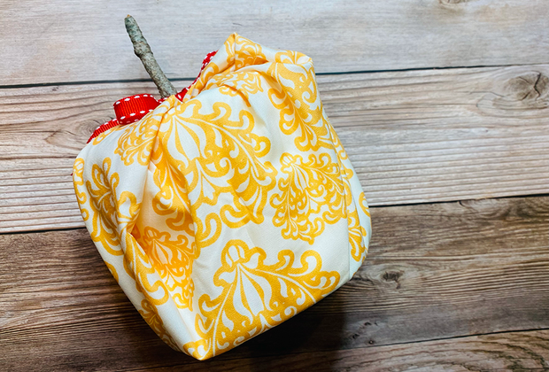 Toilet paper turns into pumpkins that decorate the house! Photo by Ally Noel for Mommy Poppins