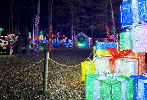 Pile of lit presents at The Village at Anne Ellen