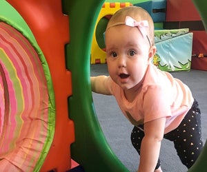 Even babies can take beginner gymnastics classes at places like My Gym! Photo by Charlotte B. for Mommy Poppins