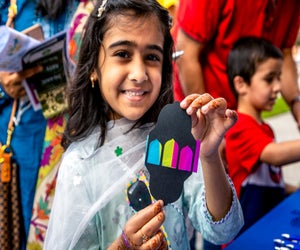 Celebrate the Festival of Eid. Photo of girl celebrating by Chris Dunn, courtesy of Asia Society Texas