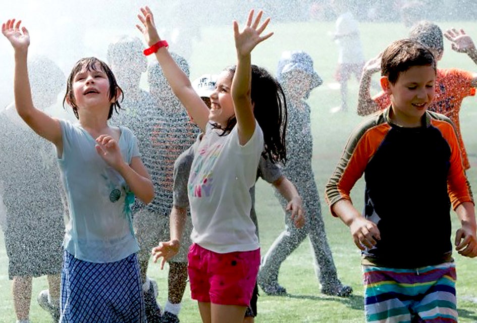 Sprinkler Day is back at Asphalt Green. Photo courtesy of Asphalt Green