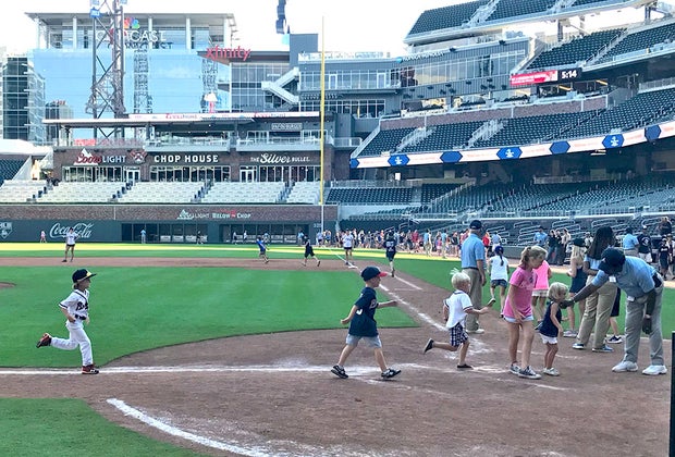 kids run the bases A Guide to Truist Park & The Battery Atlanta for Little Atlanta Braves Fans