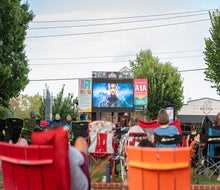Purchase dinner from local restaurants or pack one from home for Duluth's summer movie series, Flicks on the Bricks. Photo courtesy of the event