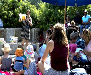 Listen as librarians read stories from the Brooklyn Public Library’s reading list at Summer Reading Storytime at Brooklyn Bridge Park. Photo by Paula Berg for BBP