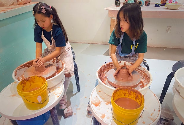 Bed-Stuy Brooklyn with kids: Girls making ceramics at Artshack