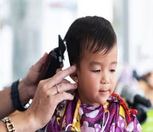 Whether you're getting your kid's first haircut or your teen needs a cool new cut, these salons and shops will take care of little New Yorkers. 