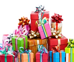Wrap up tickets or gift certificates in a pretty box to delight kids on Christmas morning.