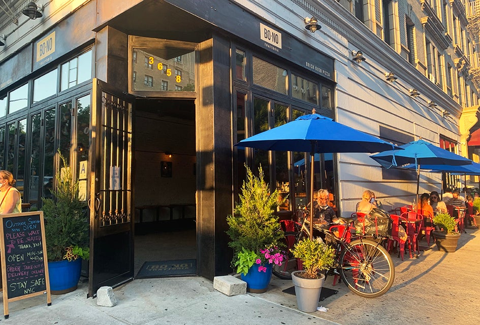 Bono Trattoria's bright exterior and fresh flavors welcome guest for outdoor dining. 
