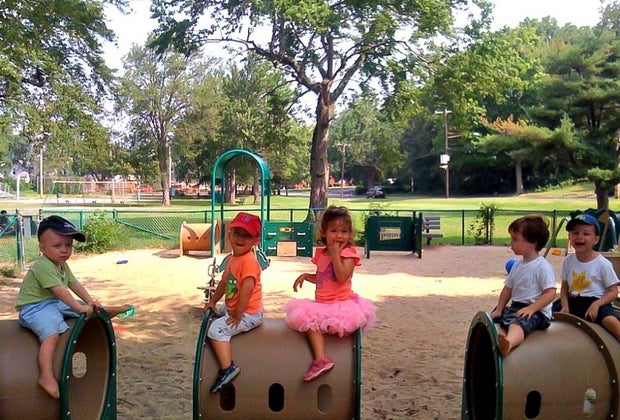 Picture of tots playing at Cabot Park toddler playground in Newton.