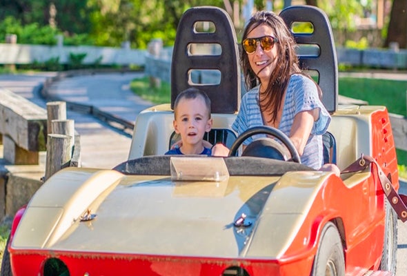 Image of mother and child riding a car at Canobie Lake Park