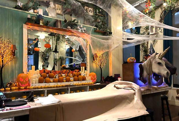 The Cauldron pumpkin patch: Halloween decorations and pumpkins line the bar