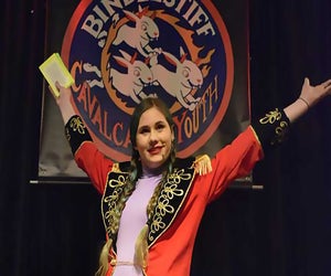 Bindlestiff Cavalcade of Youth 's Ringmistress opens the show at Coney Island. Photo by Norman Blake
