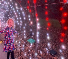 This Christmas light tunnel is pure enchantment. 