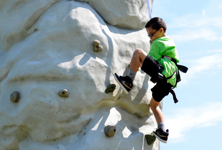Climb high at Clayton Park, where Monmouth County Parks pulls out its portable 25-foot climbing wall for visitors to scale.  