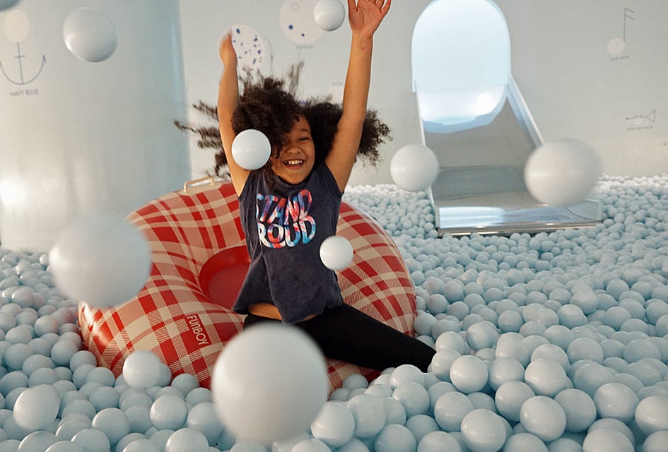 With 500,000 balls to play with, Color Factory's ball pit provides endless play and fun. 