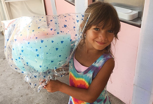 Things to do in Coney Island with Kids: Little girl with over-the-top cotton candy