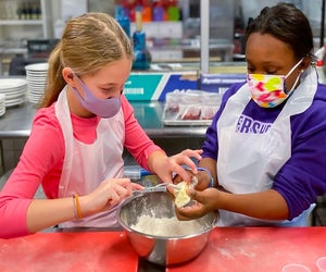 Kids can work together to make recipes at Cookology. Photo courtesy of Cookology