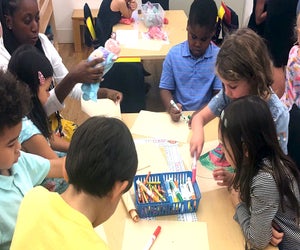 Students work together at the Corlears School. Photo courtesy of the school