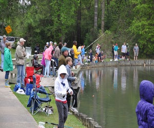 Grab your poles and get ready for a morning of fishing with friends at the Creekwood Fishing Derby. Photo courtesy of Perry Frank.
