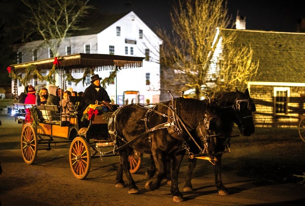 Image of horse-drawn carriage - Mystic CT is the Most Magical Christmas Town Around