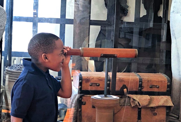 Image of child with telescope at Newburyport Museum