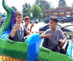 Ride the dragon coaster, if you dare, at the Bellmore Family Street Fair. Photo by Jaime Sumersille