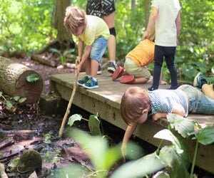 Children explore nature in Darien. Photo by Julia Arstorp Photography courtesy of Darien Nature Center
