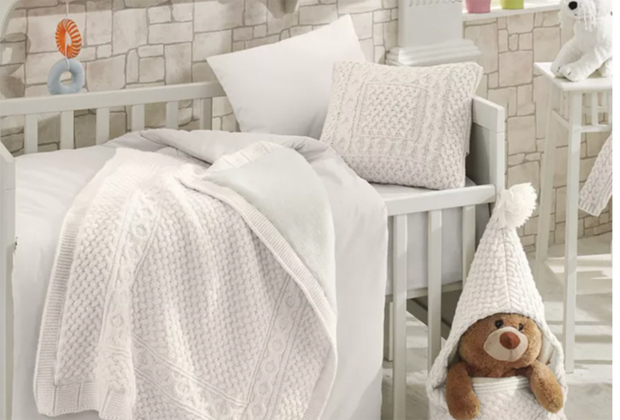 Plush-baby-bedding: Deinfluencing Your Baby Registry: Baby Products You Totally Don’t Need