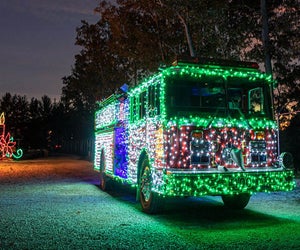 Diggerland's holiday light show turns fire trucks, big rigs, and more into stunning holiday sights. Photo courtesy of Diggerland