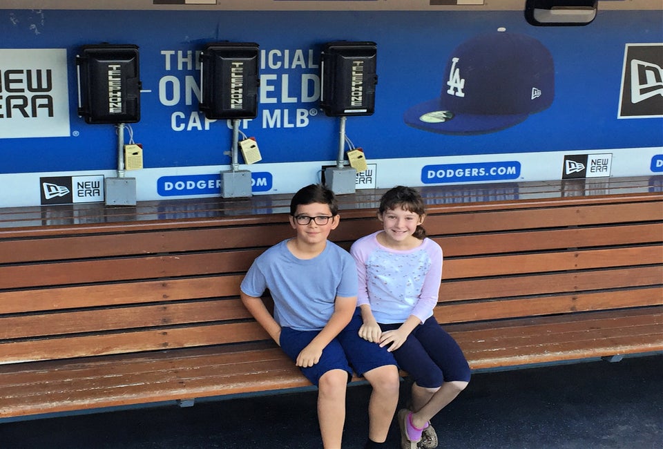 Kids can sit in the dugout when touring Dodger Stadium. Photo by Meghan Rose