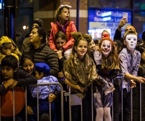 Onlookers enjoying the Arts in the Dark Parade. Photo courtesy of Natasha J Photography.