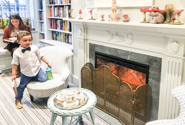 Image of family by Beacon Hill Books' fireplace, Best of Boston 2022