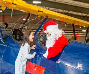 Stearman Santa ditches the deer in favor of the plane.  Photo courtesy of the  Lone Star Flight Museum 