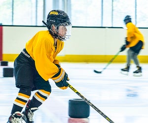 Kids hockey classes are a New England classic! Photo courtesy of the Warrior Ice Arena