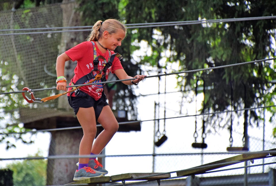 Test your courage at Treetop Adventures. Photo courtesy of Elmwood Park Zoo