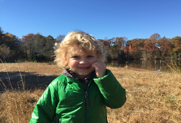 Child in a field at Washington Lake Park
