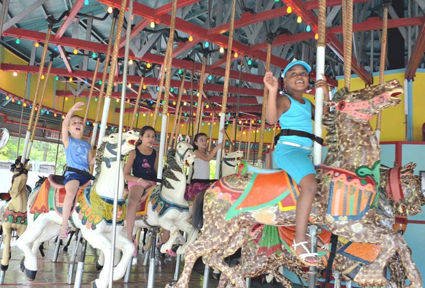 Flushing Meadows Corona Park with kids carousel