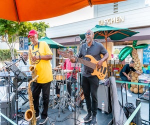 Summer Music Series at the Farmers Market is perfect for cheap dinner and a free show. Event photo courtesy of the market