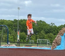 Kids of all ages and abilities go wild for a romp in the inclusive Toms River Field of Dreams Playground. 