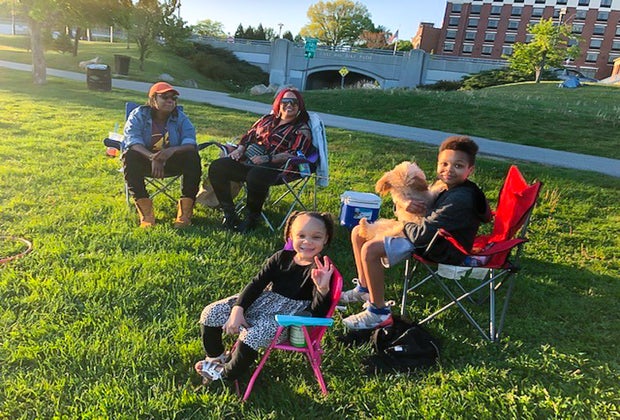 Photo of a family in a park-this to do in Providence with kids