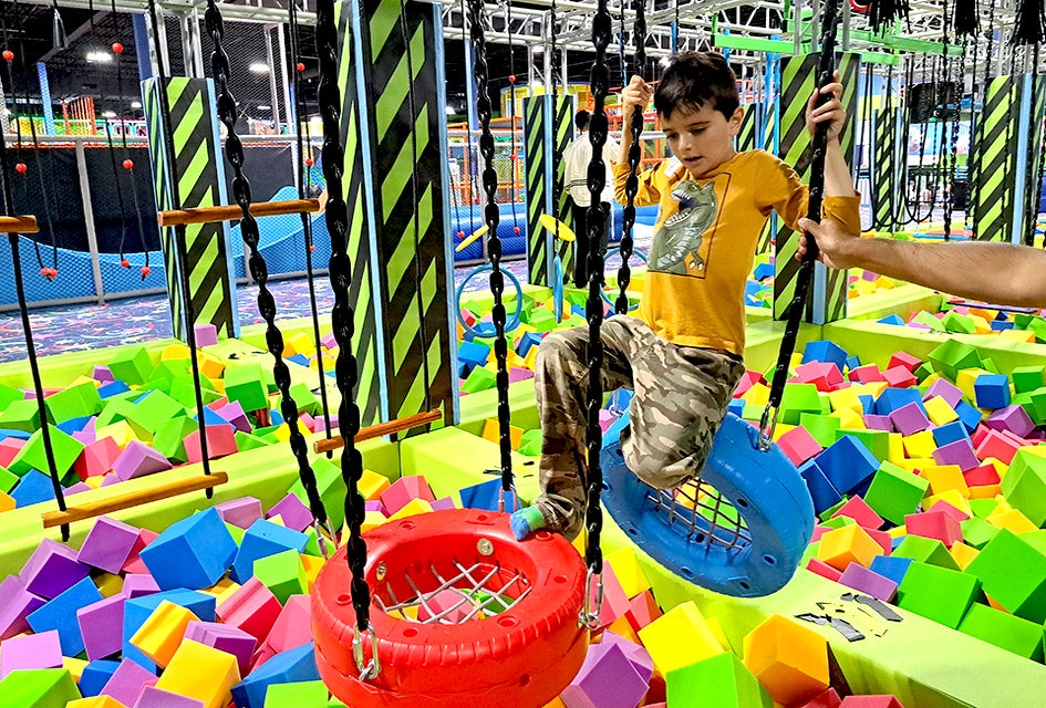 Fun Max Adventure Park's features include slides, a ball pit, and an obstacle course.
