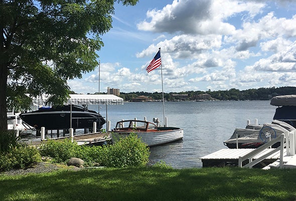 xploring the Shore Path of Lake Geneva: Boats dot the lake in the summer