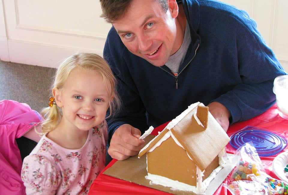 Decorating a gingerbread house is a sweet holiday tradition for the whole family.