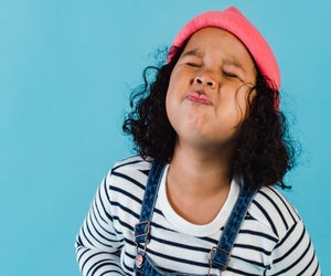 Photo of girl laughing by Amina Filkins via Pexels